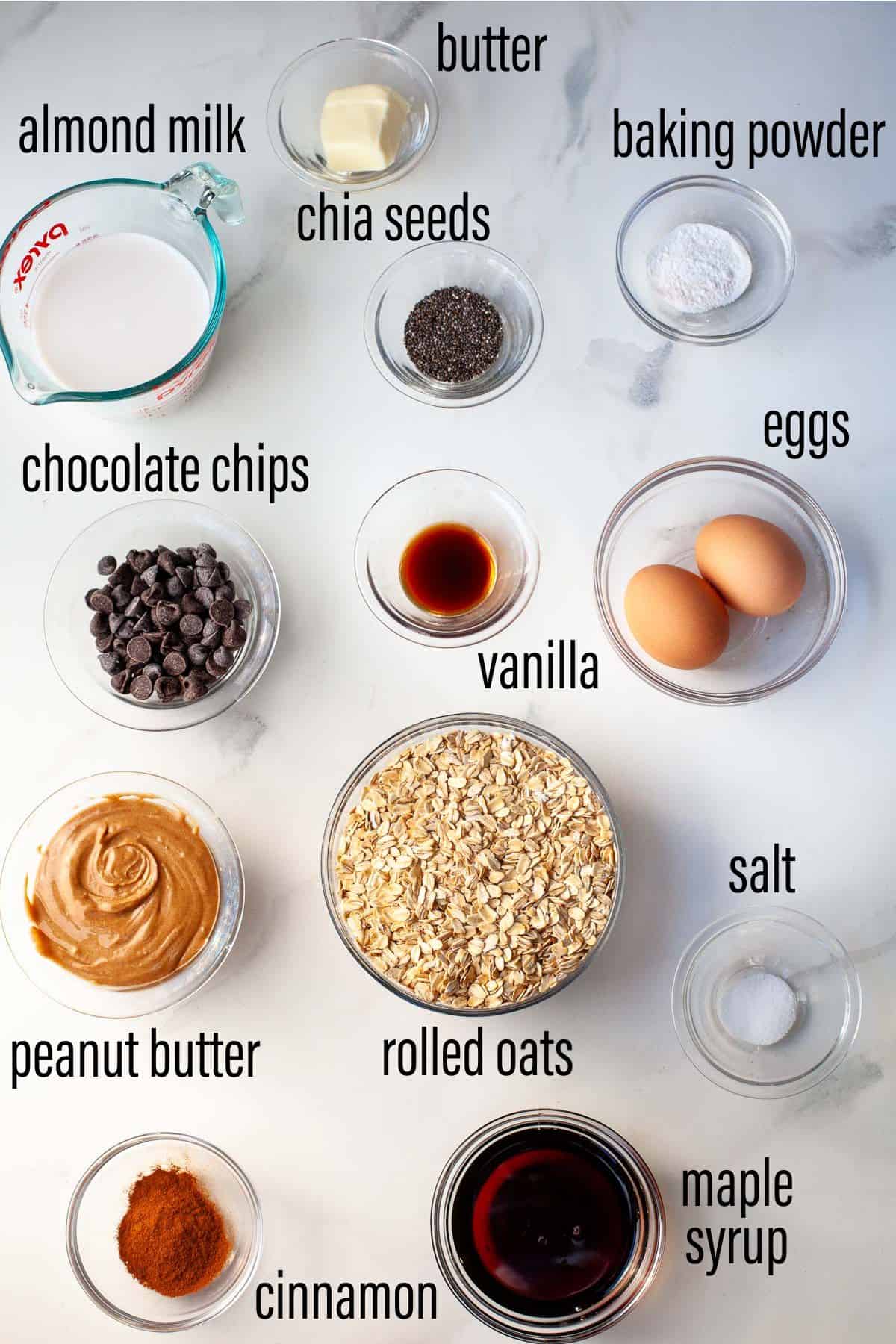 graphic of ingredients for peanut butter baked oatmeal on marble surface with black text overlay
